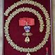 Collar, insignia de cuello y miniatura de la Orden española del Toisón de Oro